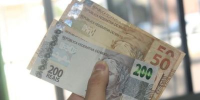 Caixa paga Bolsa Família com adicional de R$ 150 para beneficiários com NIS final 9